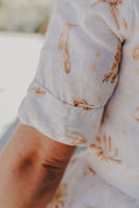 The Michelle Turner Bird Print Caramel Short Sleeve Dress