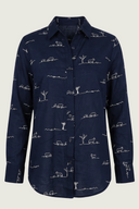 Navy blue shirt with white graphic patterns on a beige background