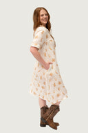 Feather and Flight Linen Dress